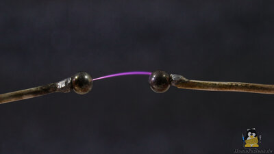 5mm steel balls connected to high voltage, small gap