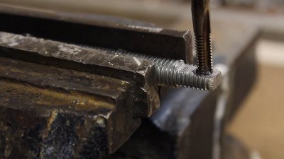 Cutting a thread with tappers