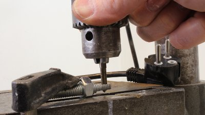 Cutting a thread with a drill press