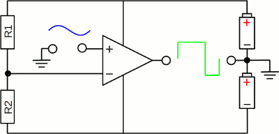 Comparator with voltage divider at input